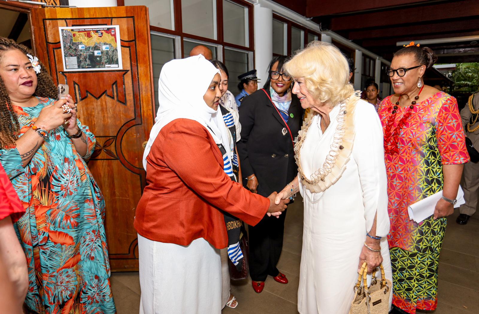 The Queen meets a young woman at the Advocating for Women and Girls in the Commonwealth CHOGM 2024 event