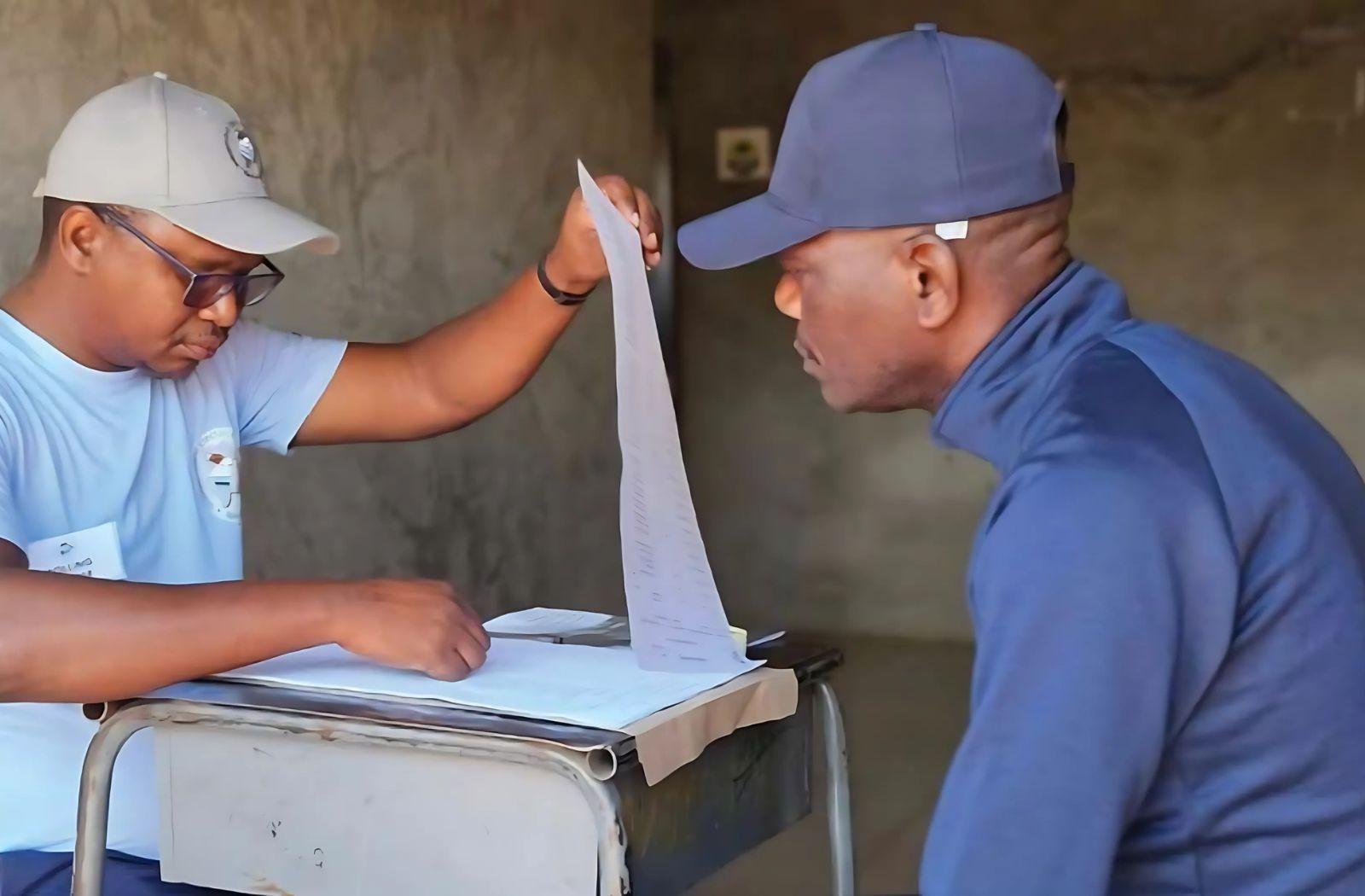 crosschecking of voter id against the electoral register in Botswana