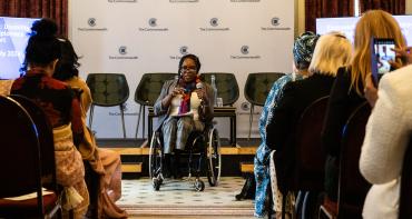“Our lives will not change unless we all change,” was the impassioned message of Anne, sitting in a wheelchair, to the attendees