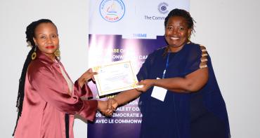 Two women standing posing for a photo