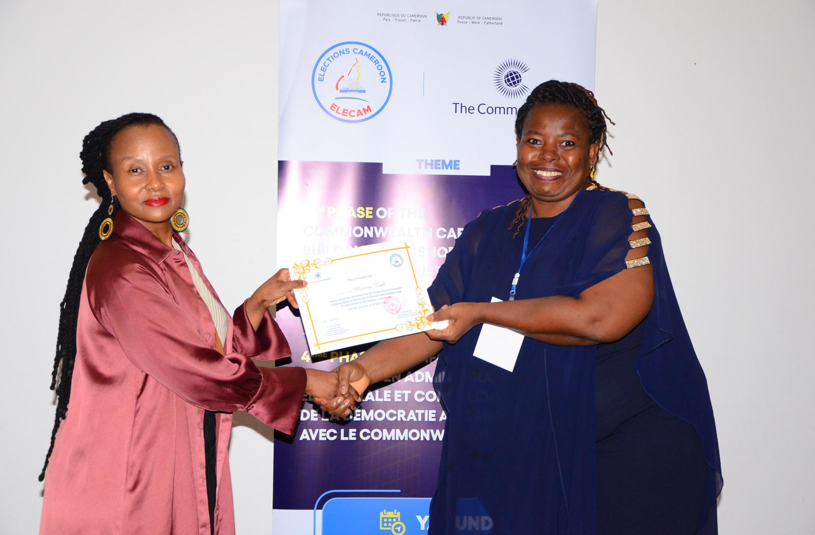 Two women standing posing for a photo