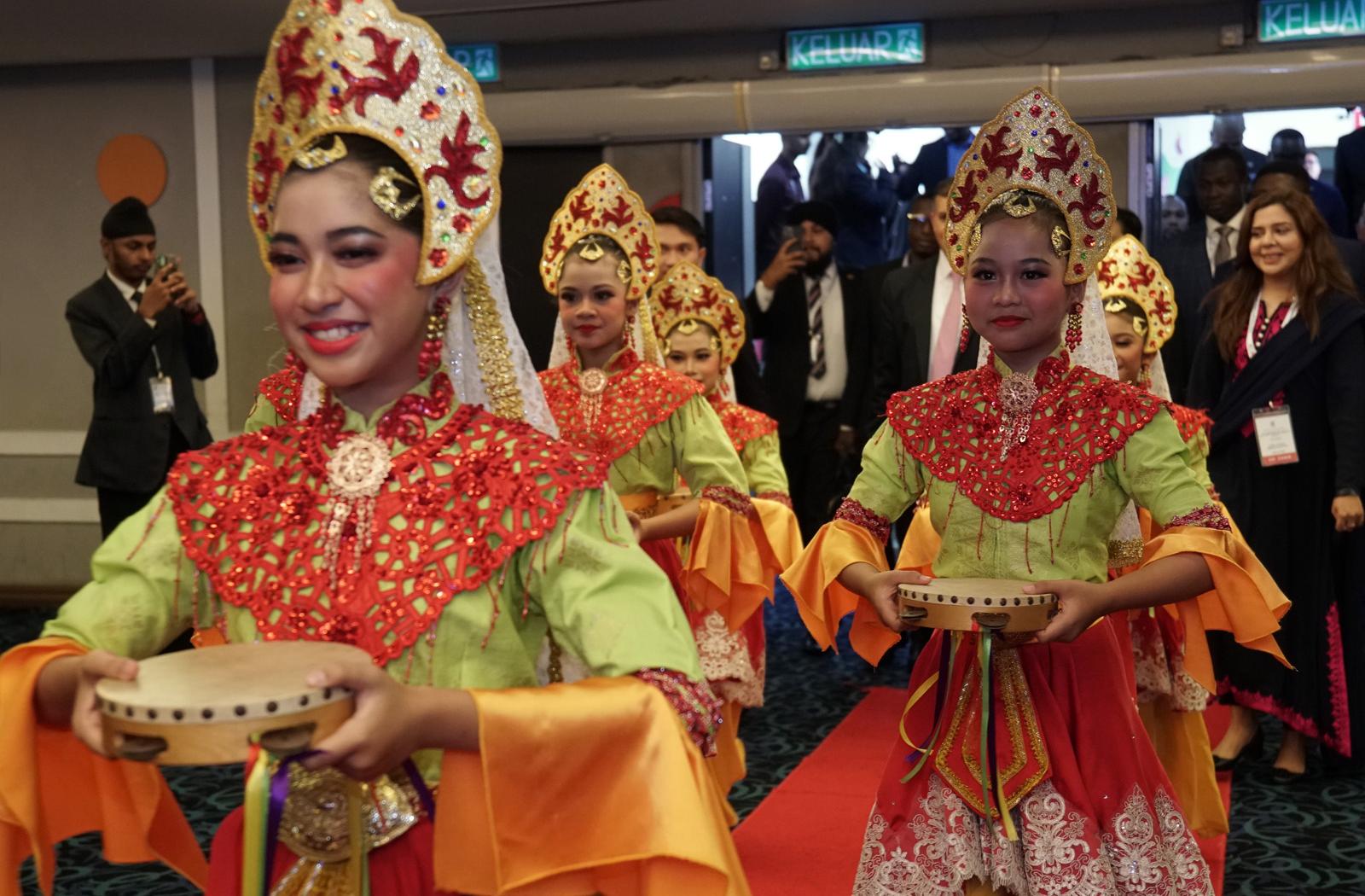 dancers in traditional dress at the Global Youth Work Conference 2025 opening ceremony 
