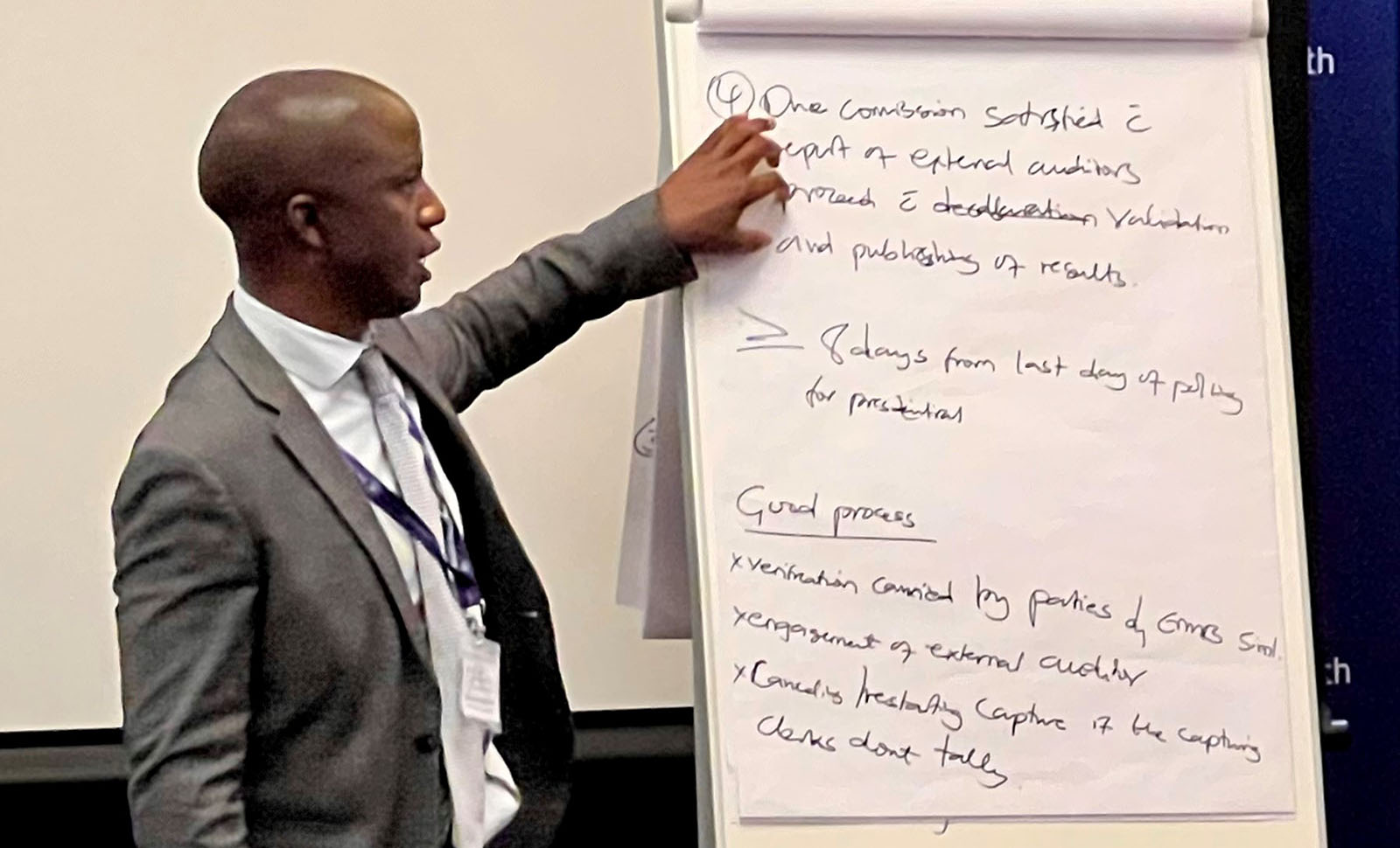 Sangwani Mwafulirwa presenting at Malawi election training