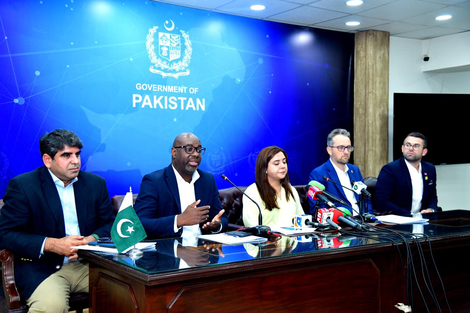 group shot of 5 people sat